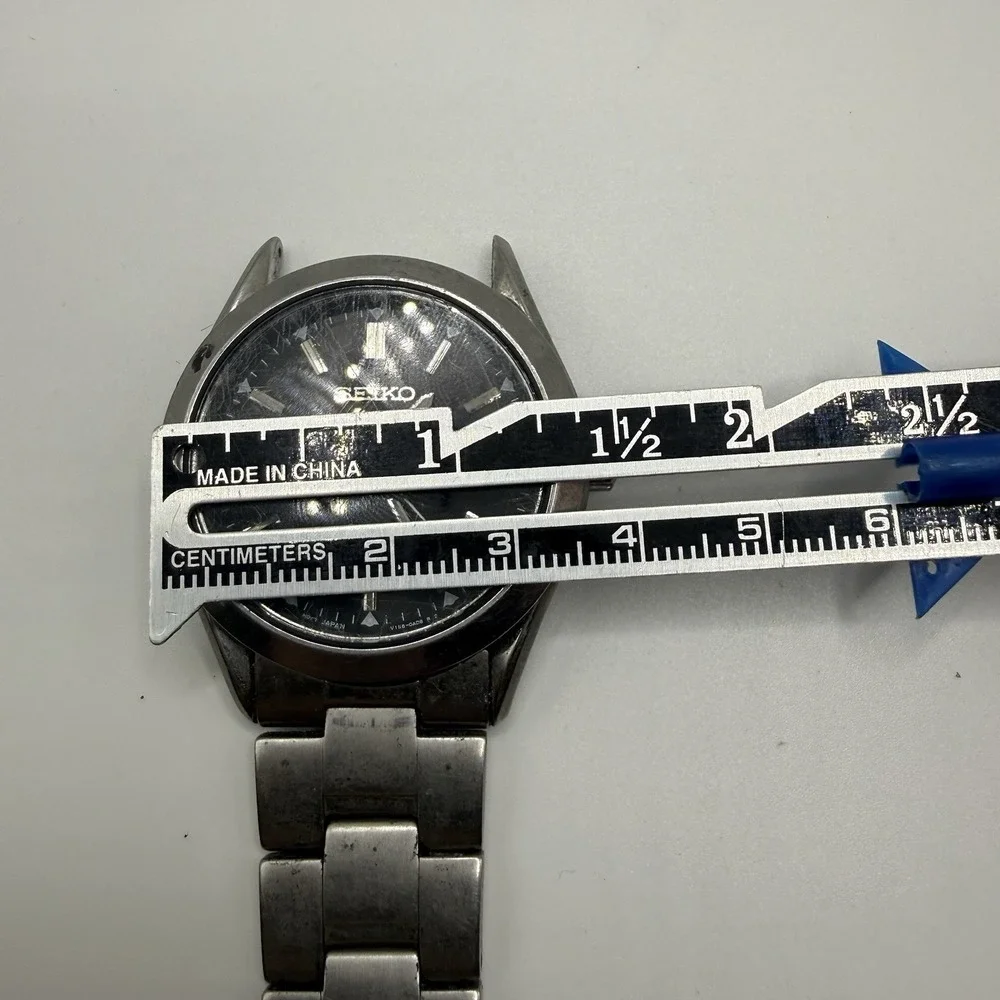 Seiko Men V158-0AB0 Dress Black Dial‎ Day Date Stainless Solar 37mm Watch